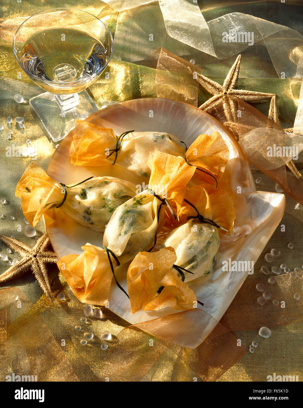 Cappesante avvolto in filo pasticceria Foto Stock