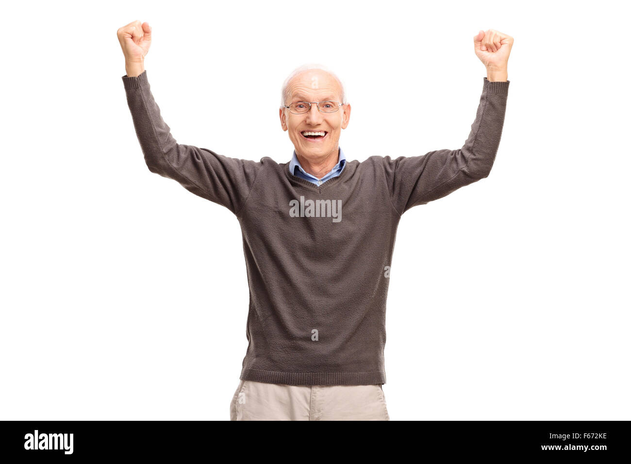 Felice alti gesti di gioia con entrambe le mani in aria isolata su sfondo bianco Foto Stock