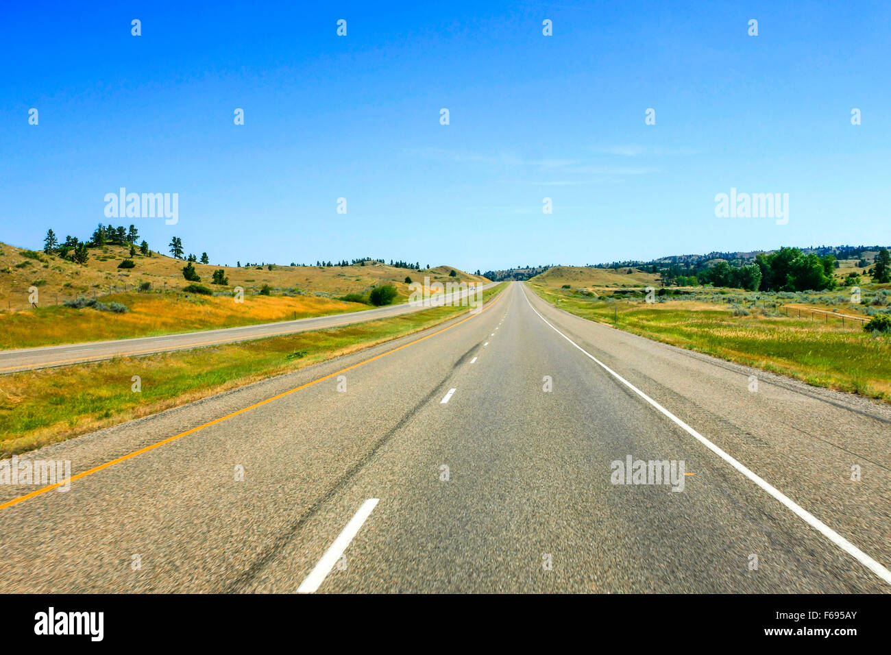 Interstate 94 in North Dakota, forse una delle strade più dritte in America Foto Stock