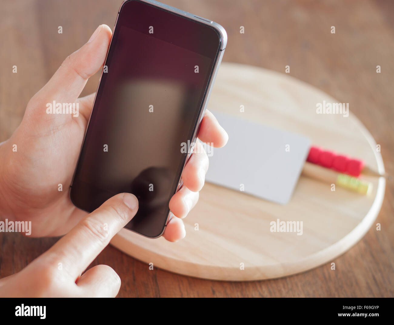 Smart phone in una donna di mano, stock photo Foto Stock