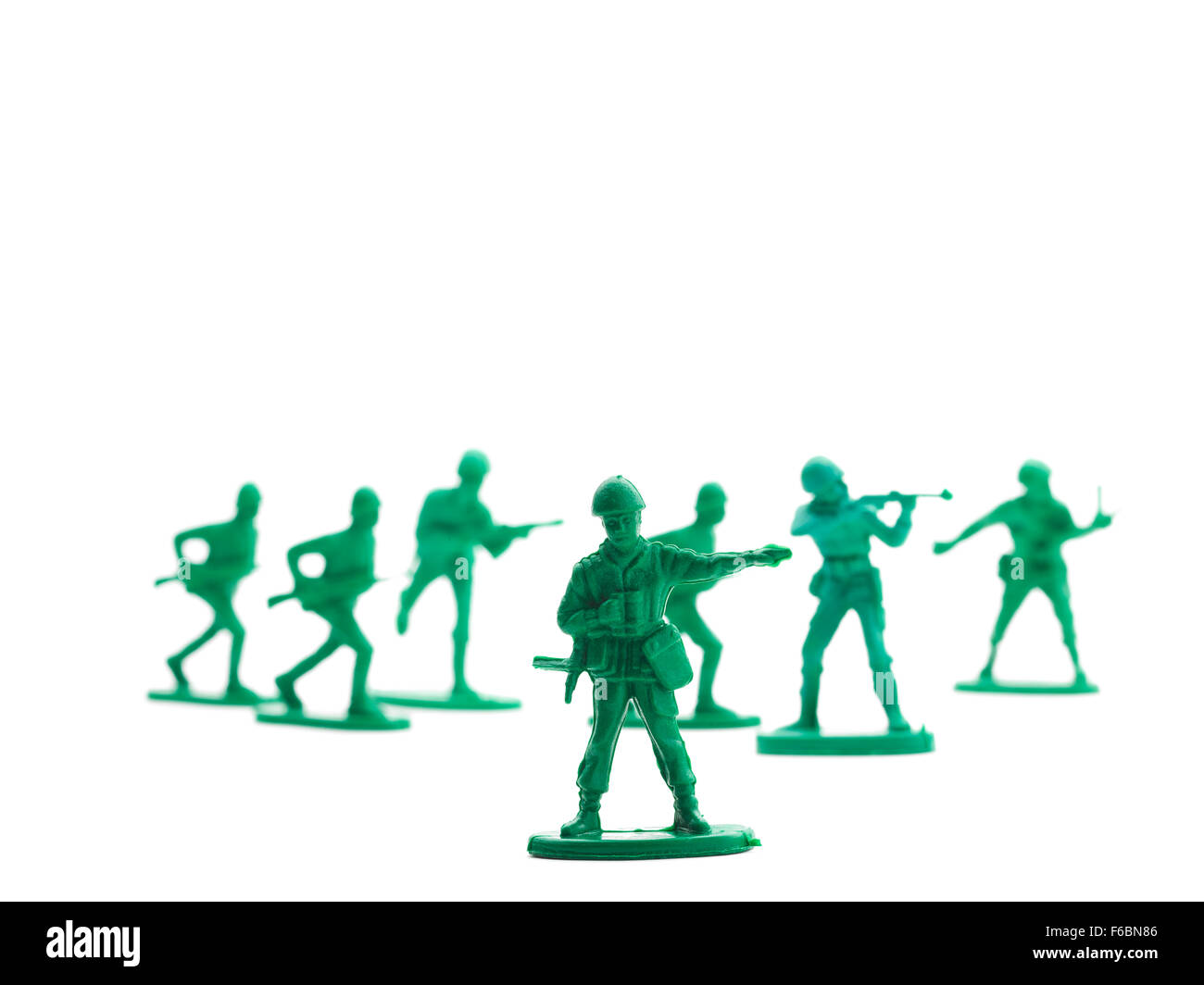 Soldati di plastica team, sfondo bianco Foto Stock