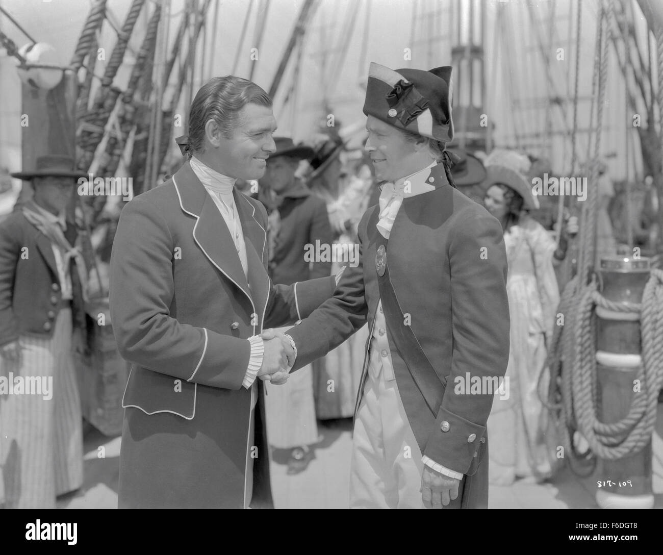 Data di rilascio: 22 novembre 1935. Il titolo del filmato: l'ammutinamento del Bounty. STUDIO: Metro Goldwyn Mayer (MGM). Trama: il guardiamarina Roger Byam si unisce il Capitano Bligh e Fletcher Christian a bordo della HMS Bounty per un viaggio a Tahiti. Bligh dimostra di essere un tiranno brutale e dopo sei mesi di piacevole a Tahiti, Christian conduce all' equipaggio di ammutinamento sul homeward voyage. Anche se Byam non prende parte al mutiny, egli deve difendersi contro le accuse che egli ha sostenuto cristiano. Nella foto: Clark Gable come cristiano. Foto Stock