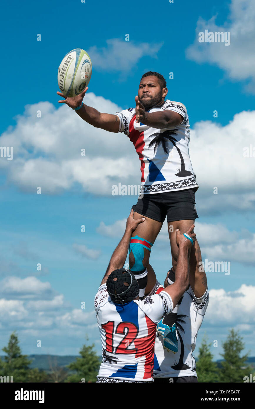 Fijian team player in azione la cattura di sfera in linea. Foto Stock