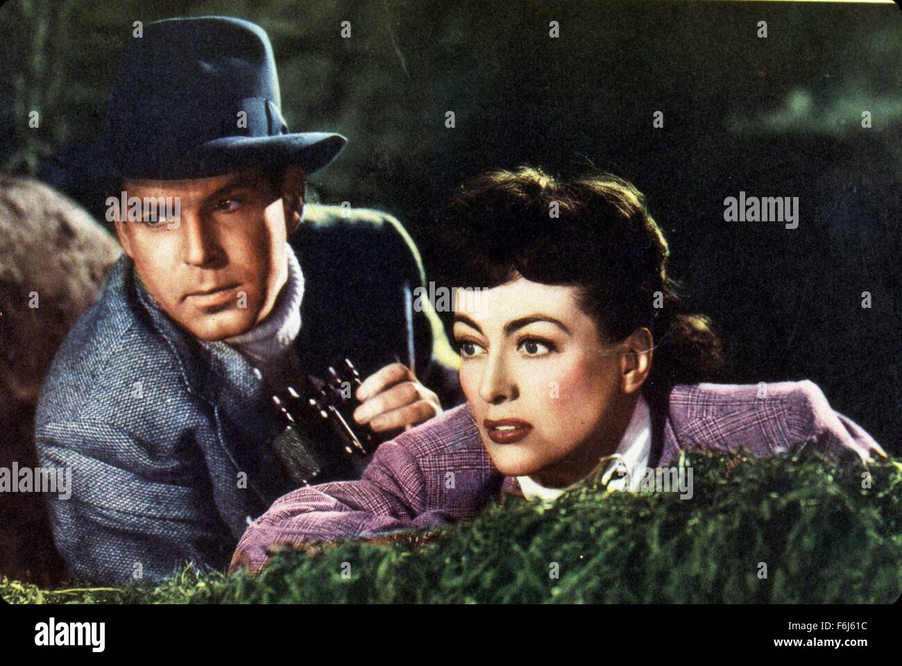 1943, il titolo del film: al di sopra di ogni sospetto, Direttore: RICHARD THORPE, Studio: MGM, nella foto: americani all'estero, Joan Crawford, FRED MacMURRAY, mistero (SPOOF-comico), Spies. (Credito Immagine: SNAP) Foto Stock