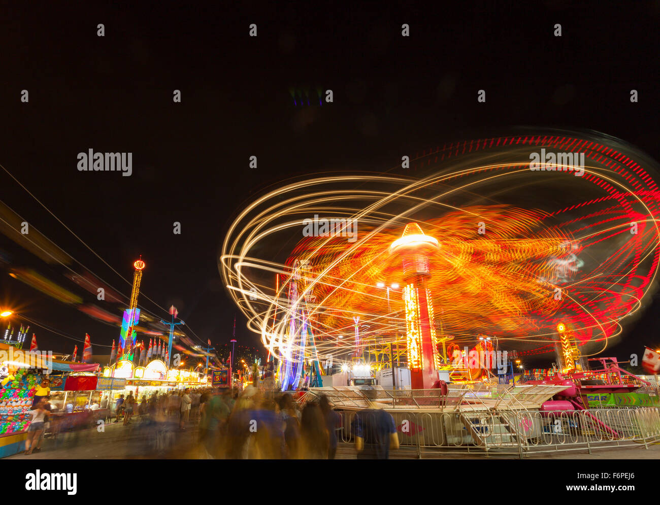L'Orbiter ride e midway games al Canadian National Exhibition (CNE). Toronto, Ontario, Canada. Foto Stock