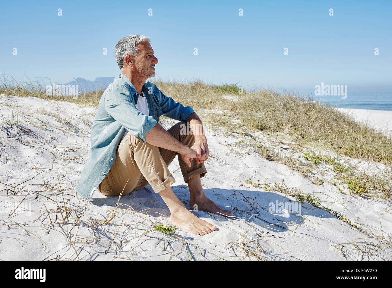 Best Ager in spiaggia Foto Stock