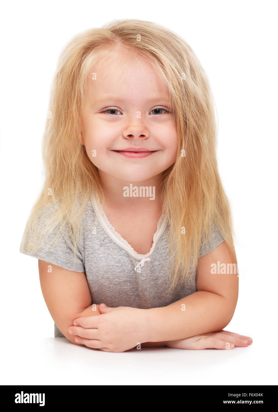 Felice bambina a su sfondo bianco Foto Stock
