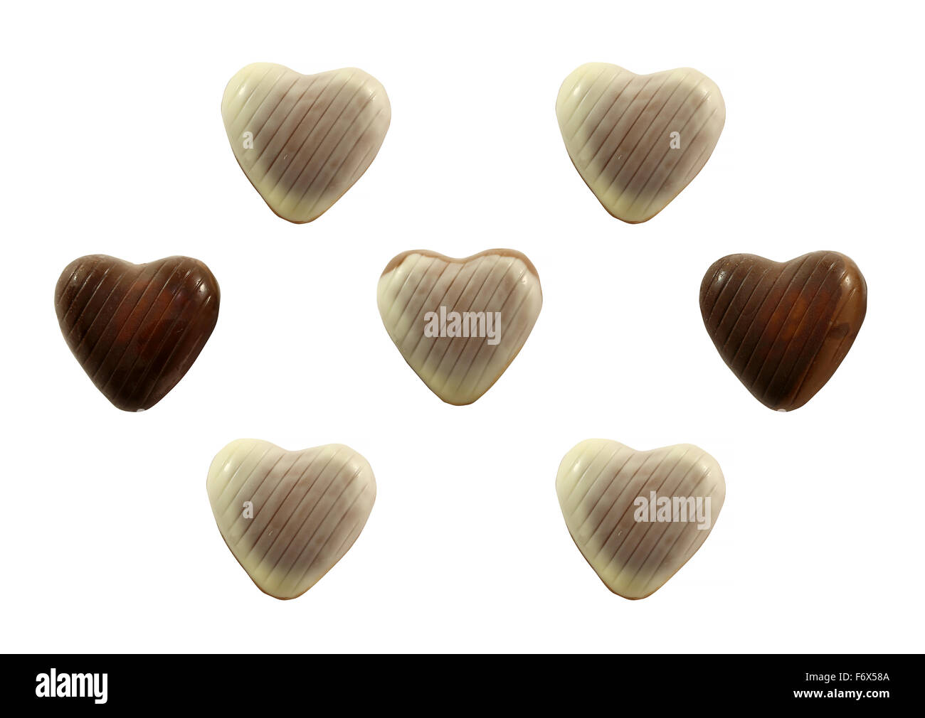 Gustosi cioccolatini close-up fotografato su sfondo bianco Foto Stock