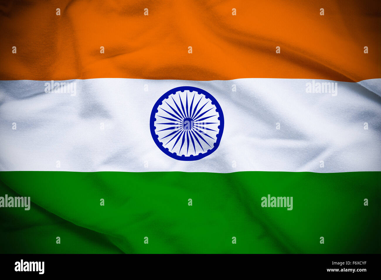 E ondulato increspato bandiera nazionale dell'India sfondo. Foto Stock