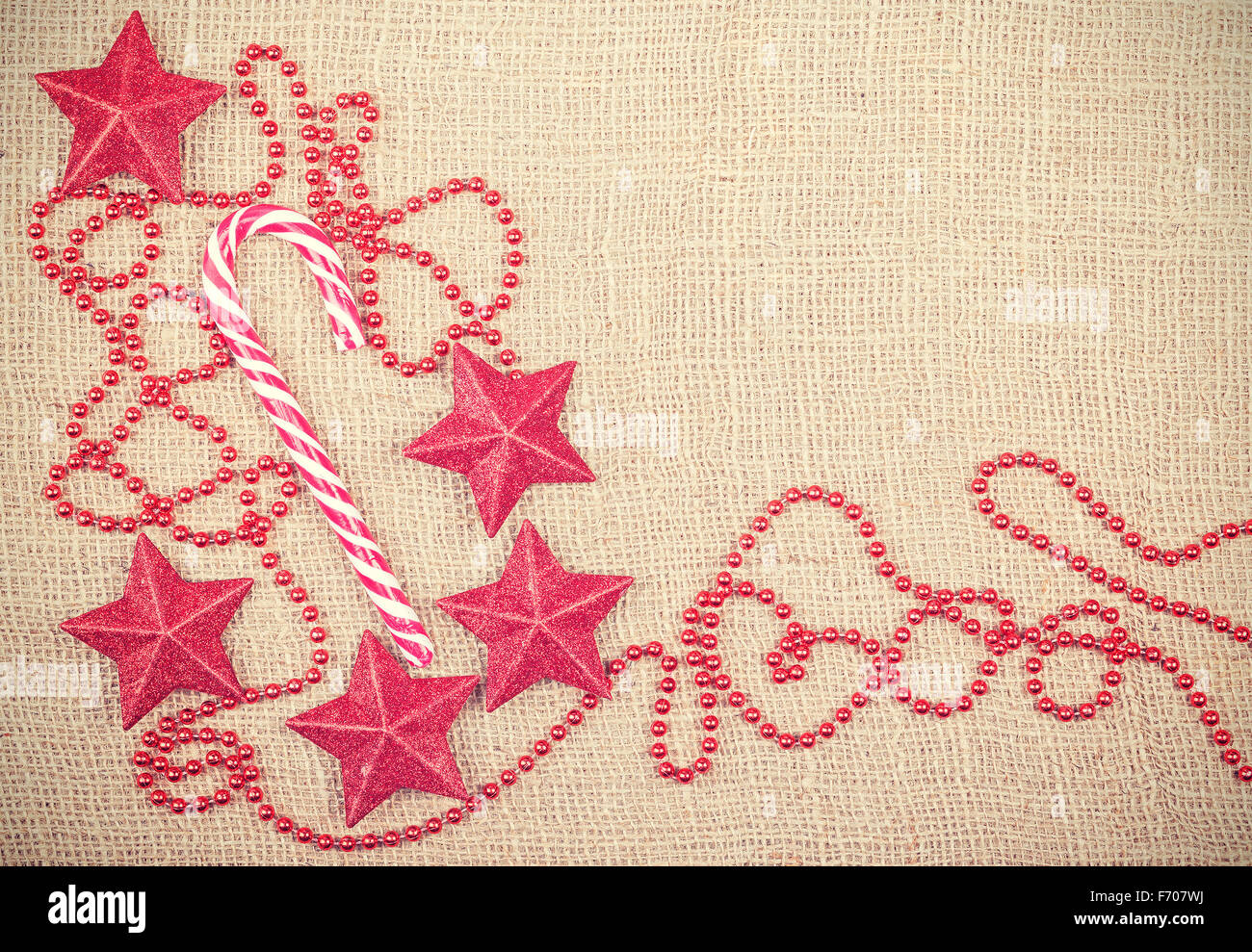 Stile retrò sfondo di Natale sul lino texture. Foto Stock