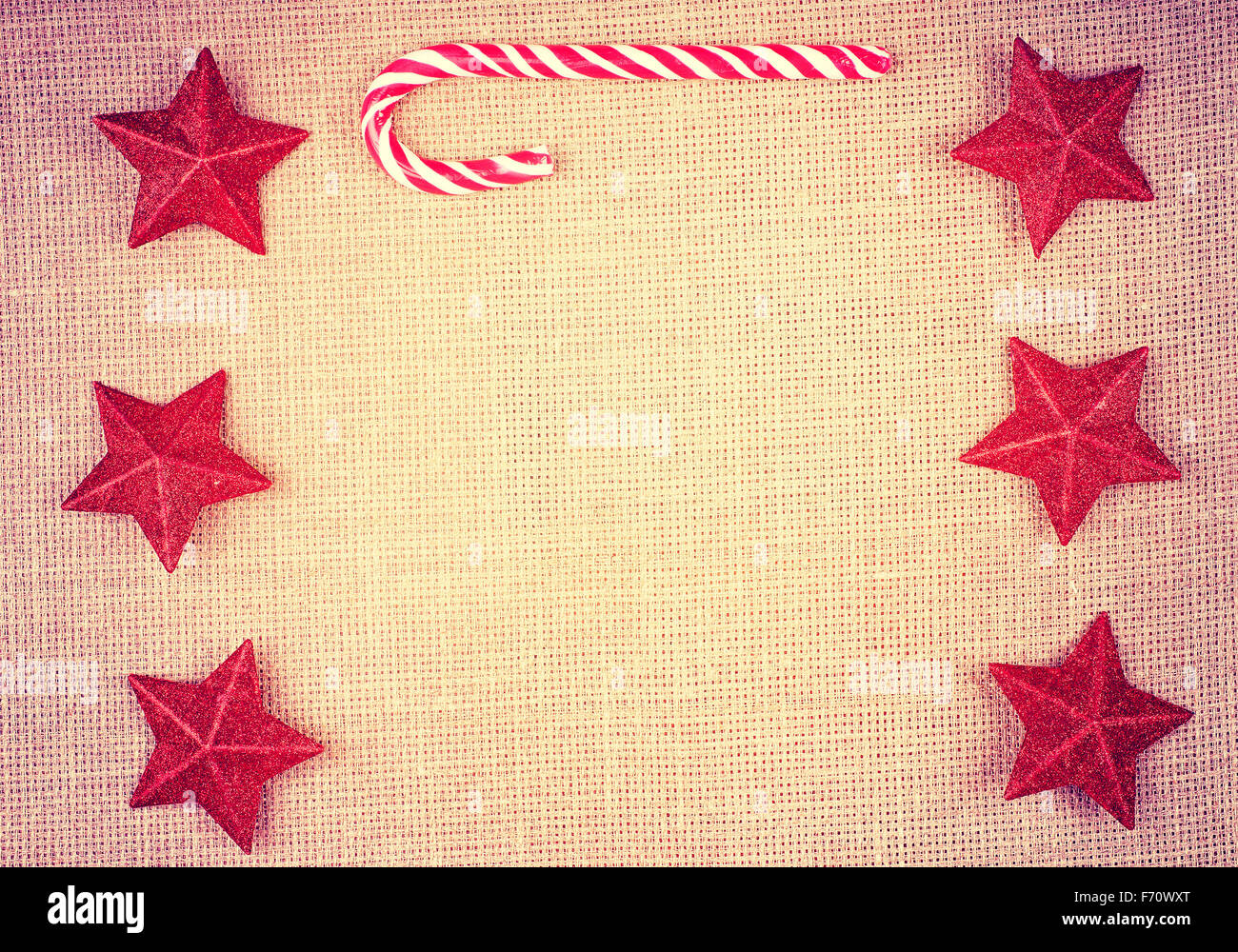 Vintage tonica decorazioni di Natale sulla biancheria, spazio per il testo. Foto Stock
