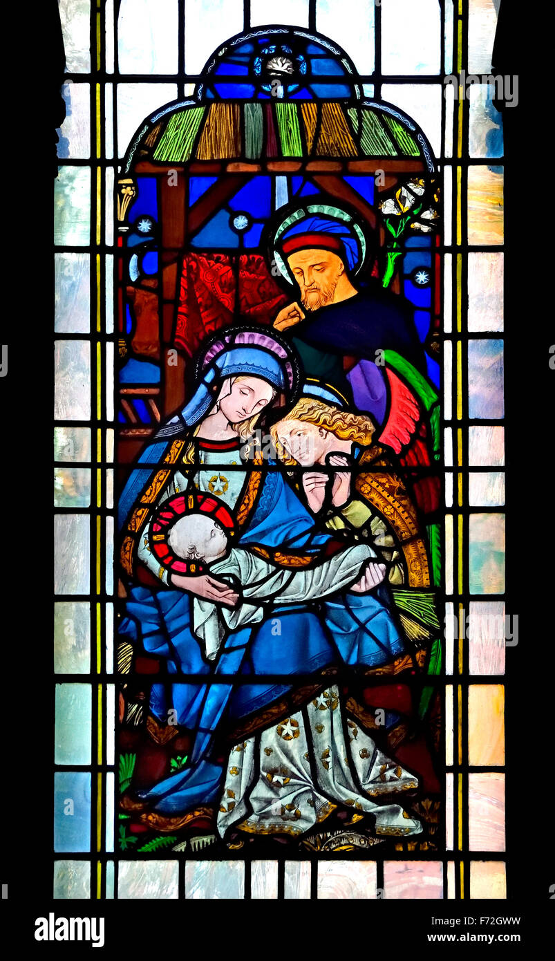 Londra, Inghilterra, Regno Unito. Chiesa Parrocchiale di San Michele Cornhill. Finestra di vetro colorato che mostra la scena della natività Foto Stock