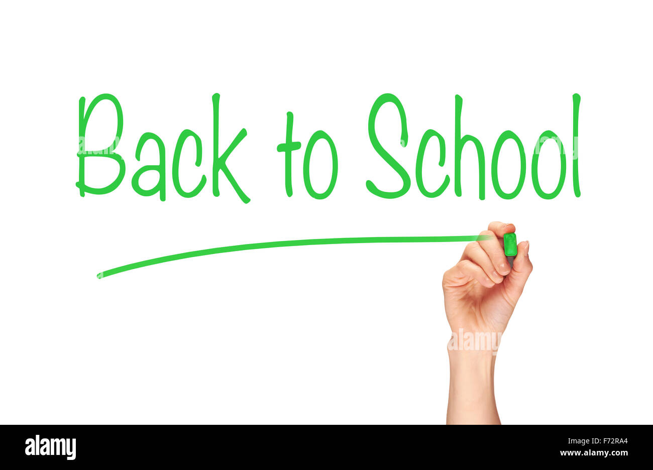 Una donna e la scrittura a mano la parola, il Ritorno a scuola su uno schermo trasparente. Foto Stock