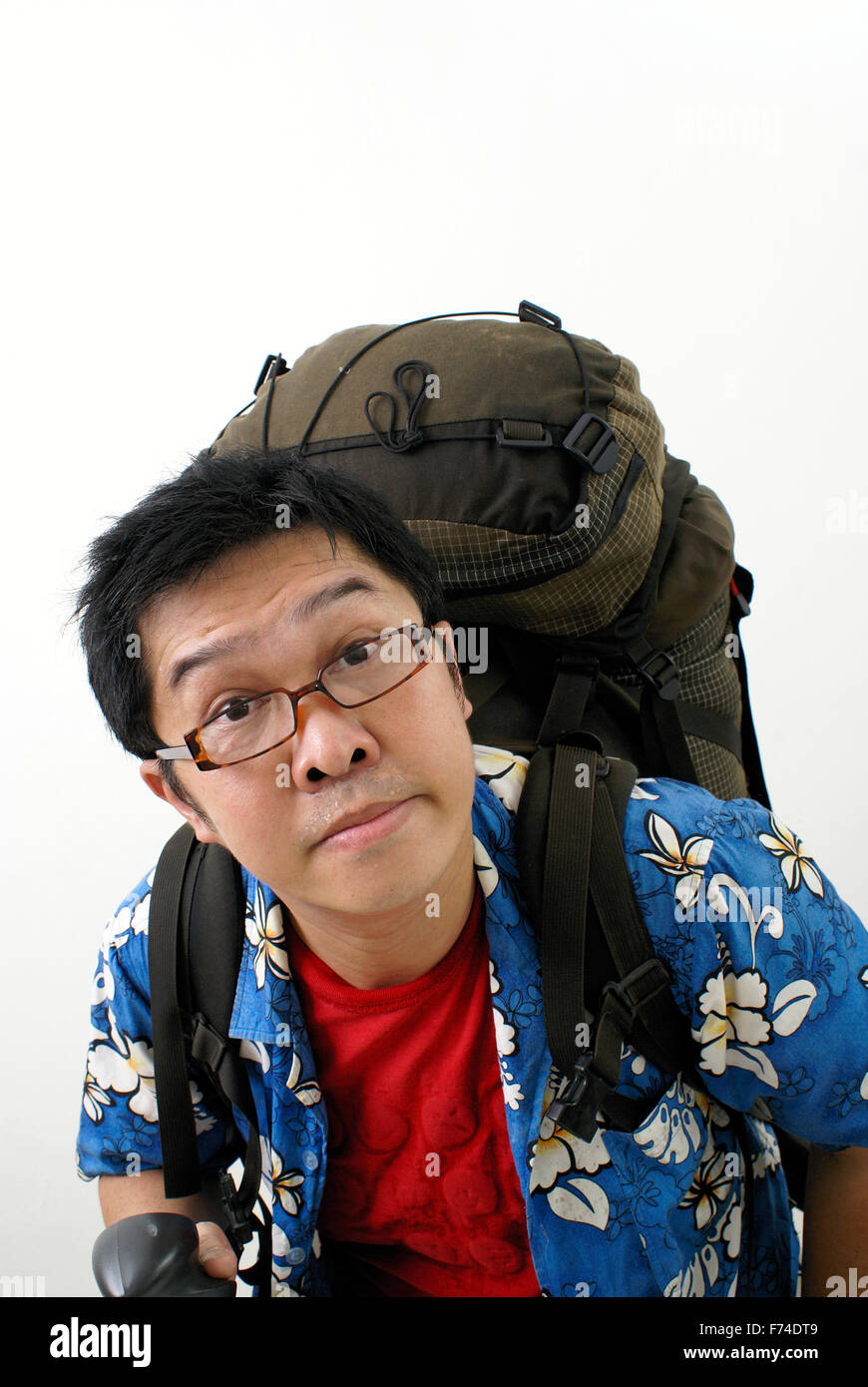 Stanco asian holiday backpacker Foto Stock