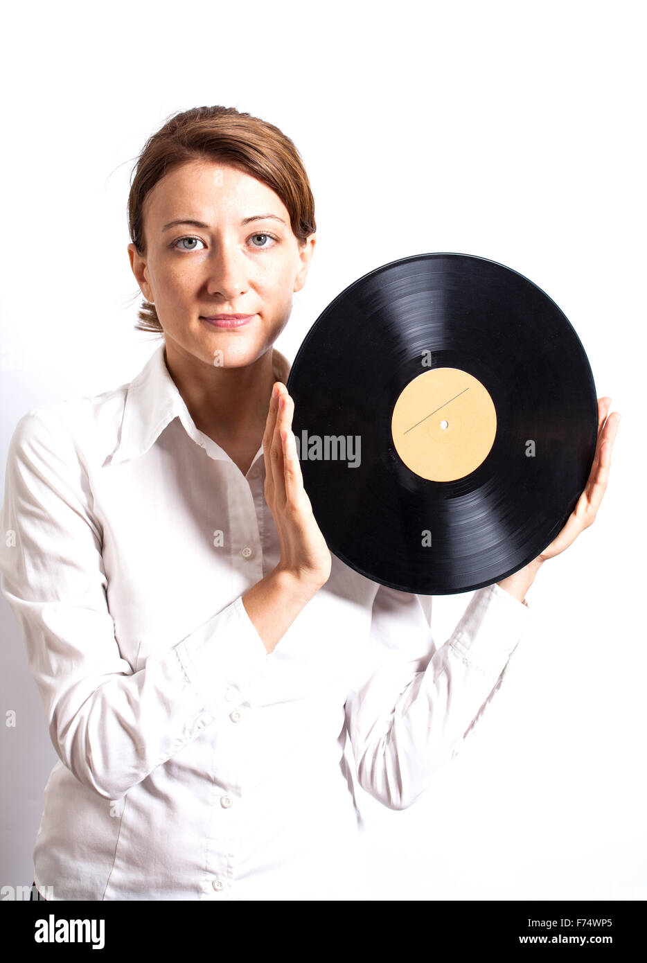 Donna che mantiene il record di vinile,closeup Foto Stock