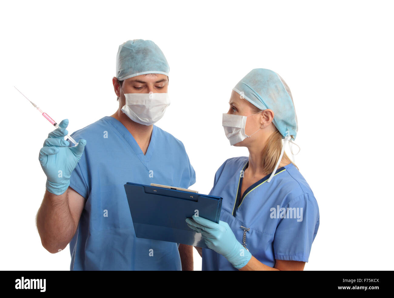 I chirurghi consulting parlare sui record medici Foto Stock