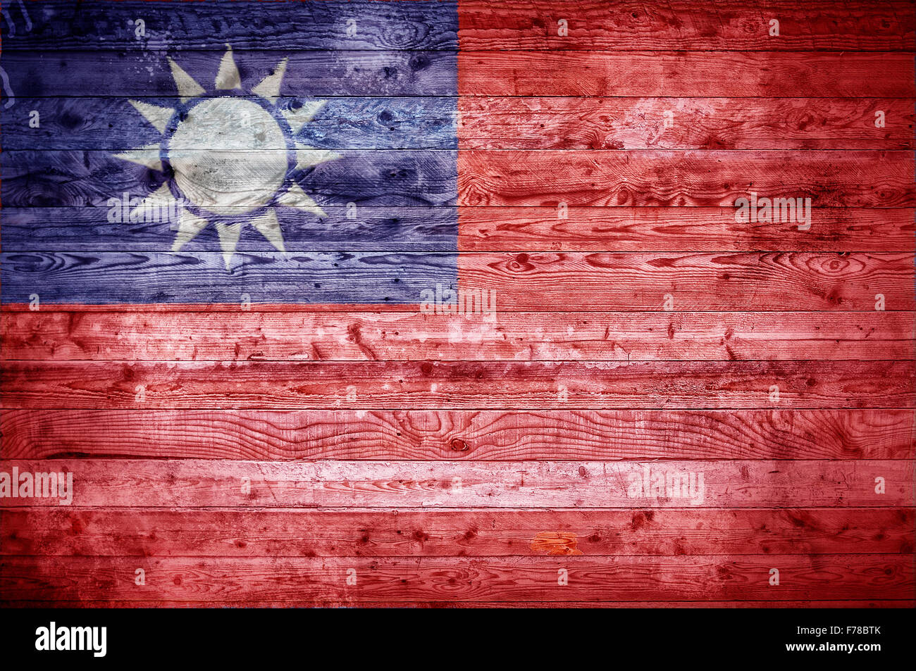 Un vignettato immagine di sfondo della bandiera di Taiwan su assi di legno di una parete o di pavimento. Foto Stock