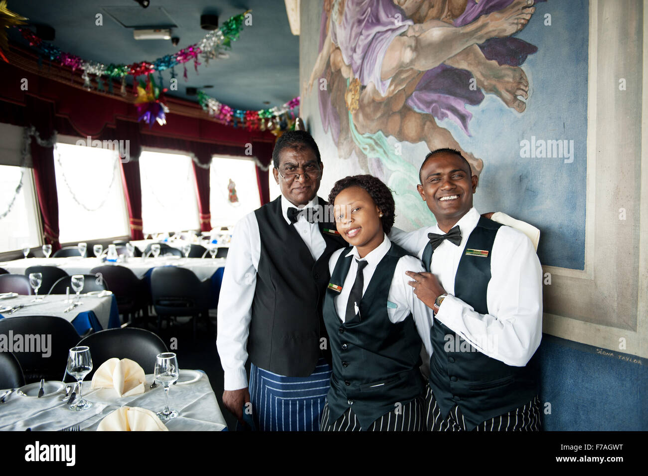I camerieri al Roma ristorante girevole a Durban in Sud Africa. Foto Stock