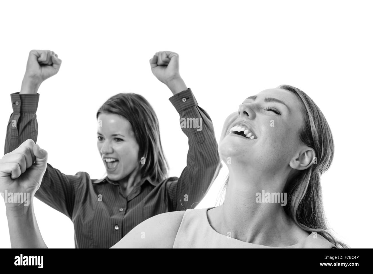 Due happy business donna con le braccia in alto in aria il tifo Foto Stock
