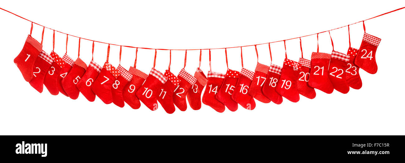 Calendario dell'avvento banner. Rosso calze di Natale isolate su sfondo bianco. Vacanze a decorazione Foto Stock