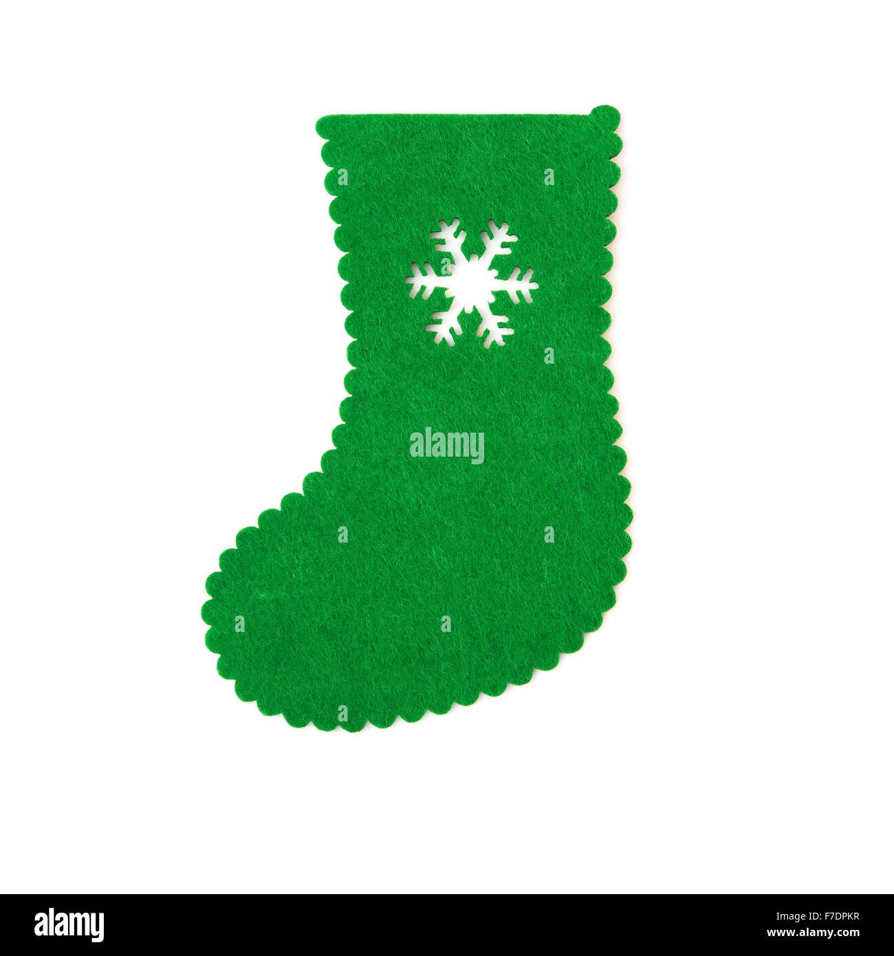 Fatto a mano verde calza di Natale con la neve ritagliato su bianco Foto Stock