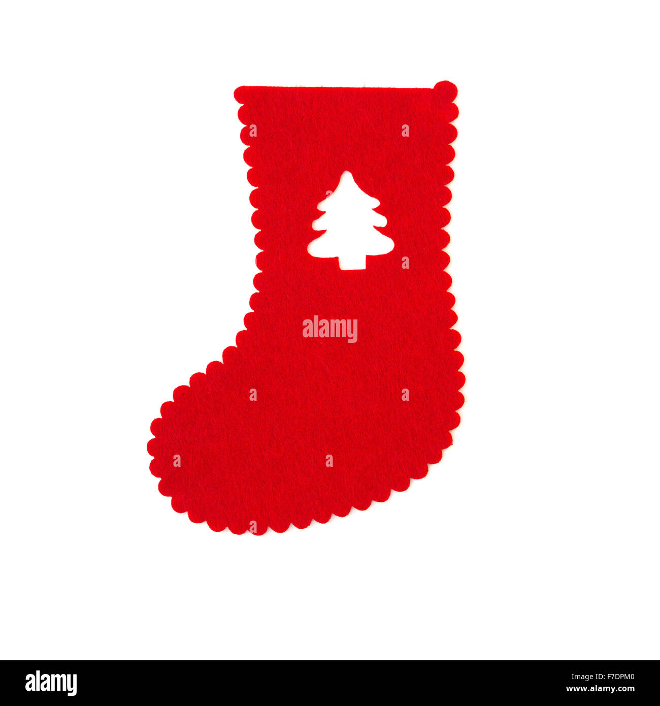 Fatto a mano rosso calza di Natale con albero di Natale tagliati su bianco Foto Stock