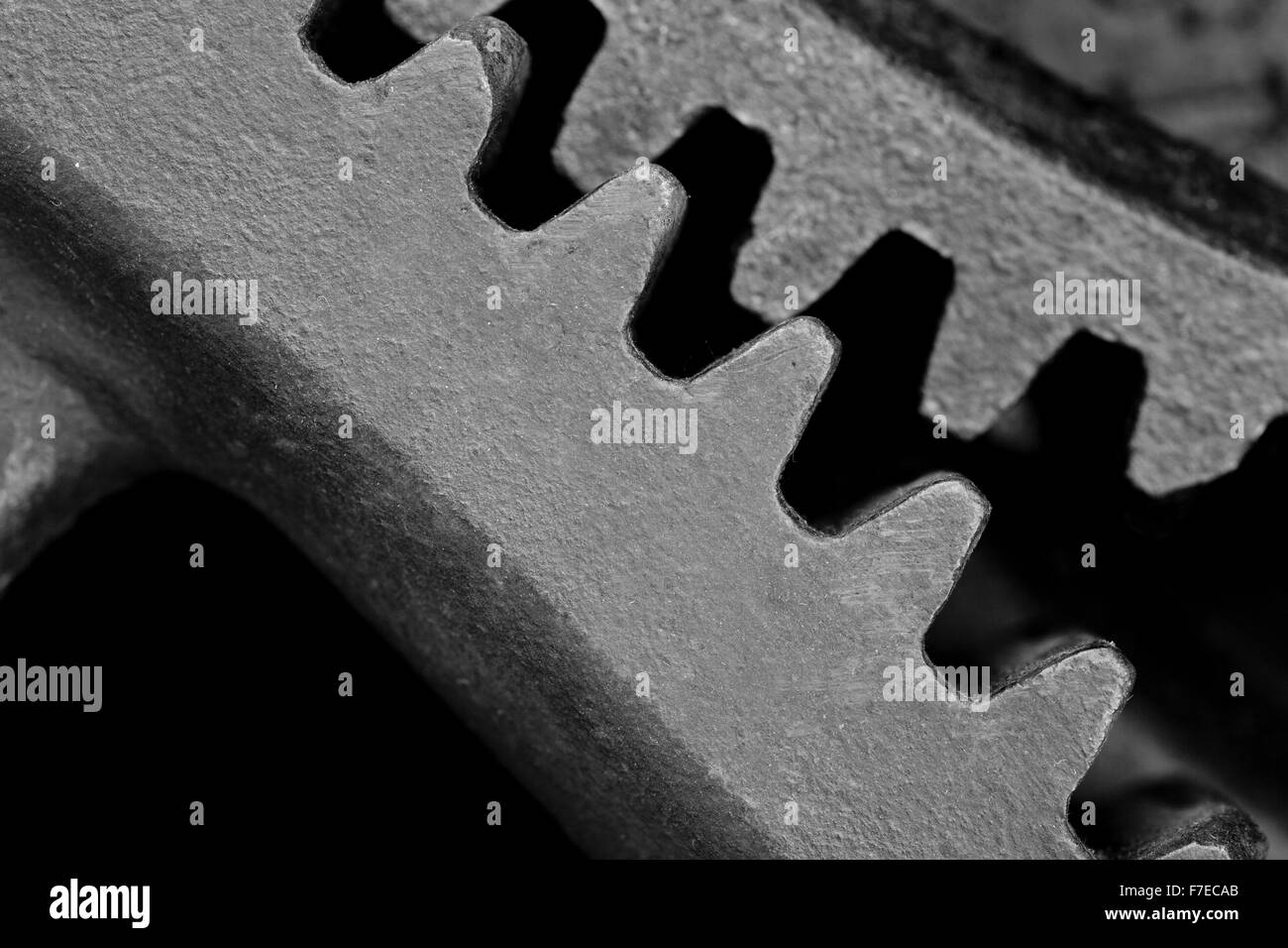 Acciaio nero ruota dentata in background o di una parte del meccanismo di vintage Foto Stock