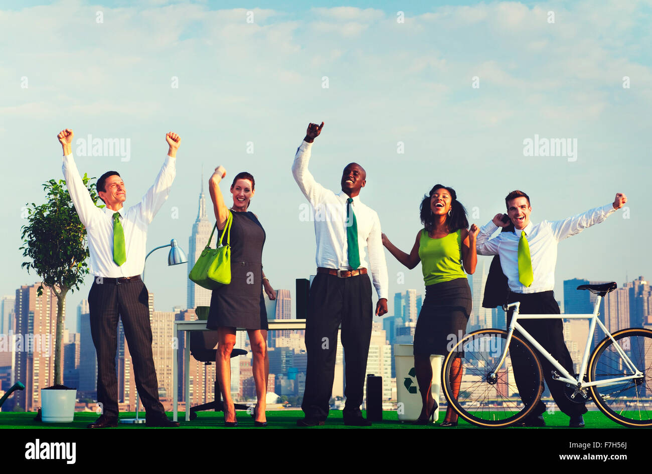 Green Business la gente celebra il concetto di successo Foto Stock