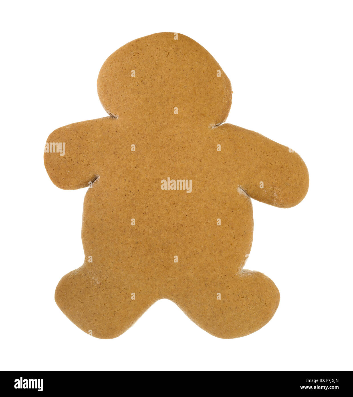 Un unfrosted gingerbread man Natale cookie su uno sfondo bianco. Foto Stock