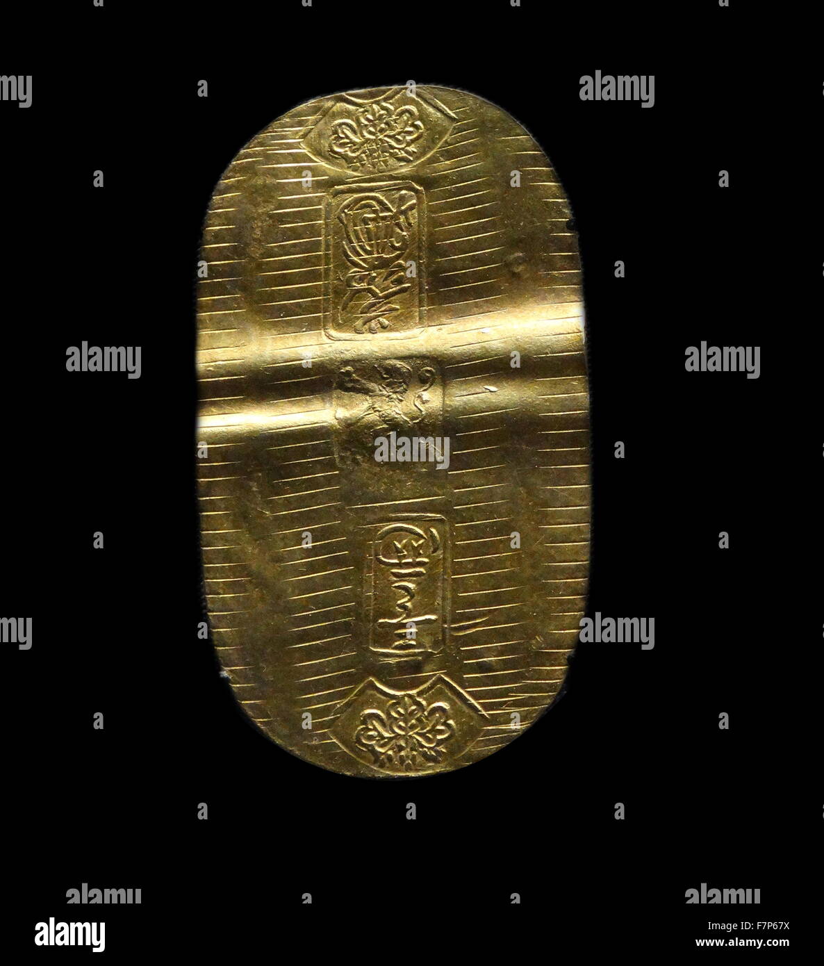 Dutch East India Company coin. Koban gold coin, Giappone, contrassegnati per l'uso in Indonesia. Risalenti al XVII secolo Foto Stock