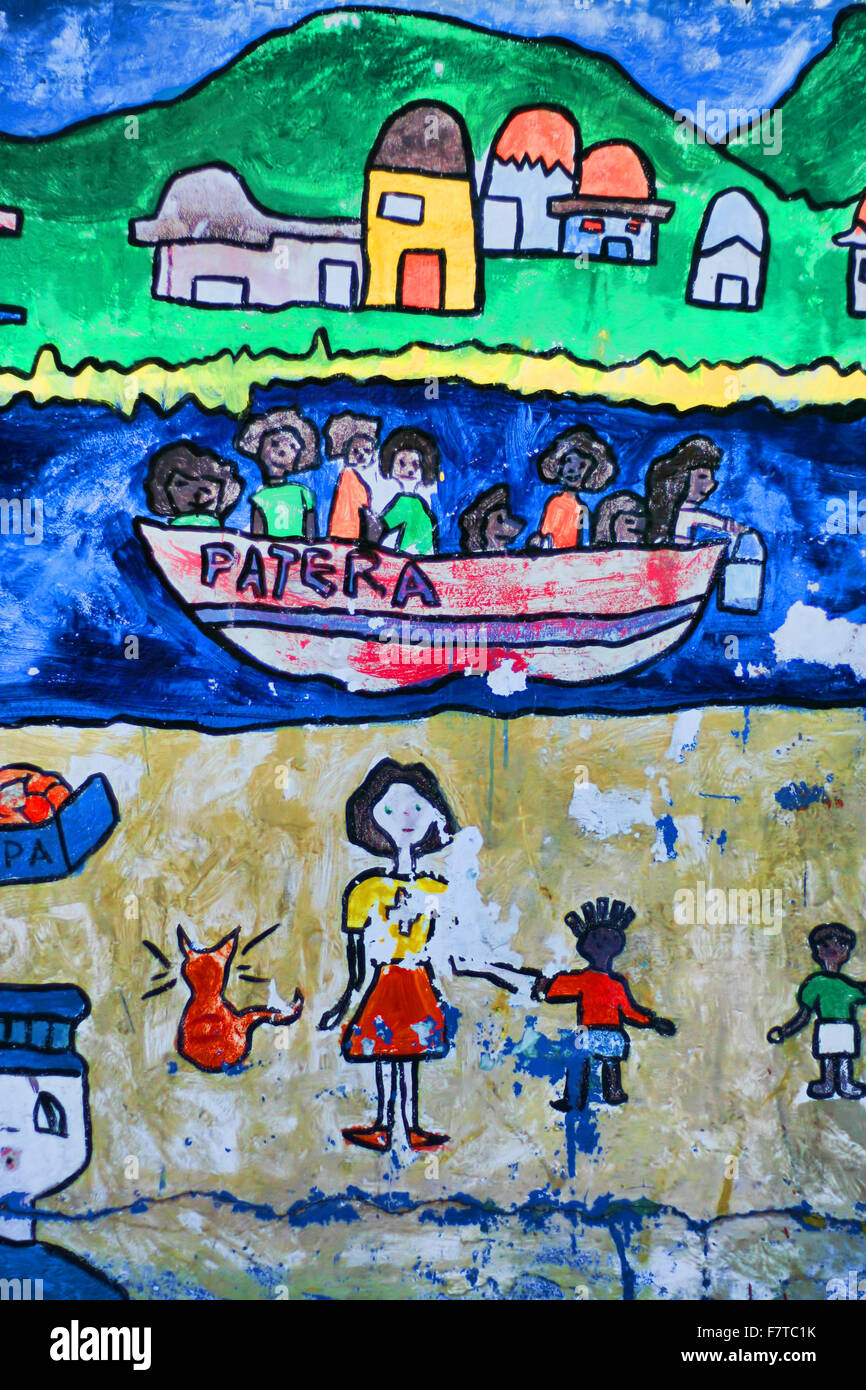 TARIFA, Cadice, Spagna - 15 agosto: dipinti di bambini circa il problema sociale di pateras. Tarifa, Agosto 15th, 2008. Gommoni Foto Stock