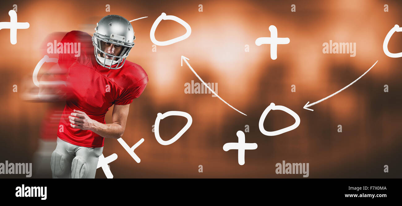 Immagine composita del giocatore di football americano in maglia rossa guardando verso il basso tenendo la sfera Foto Stock