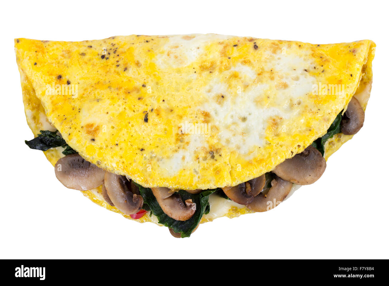 Fungo frittata di spinaci su sfondo bianco ad alto angolo di visione Foto Stock