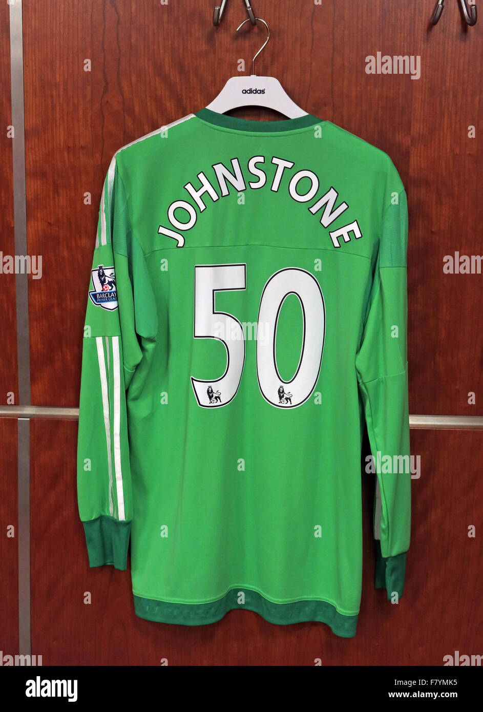 Samuel Luke 'Sam' Johnstone camicia verde in MUFC spogliatoio, Old Trafford Foto Stock