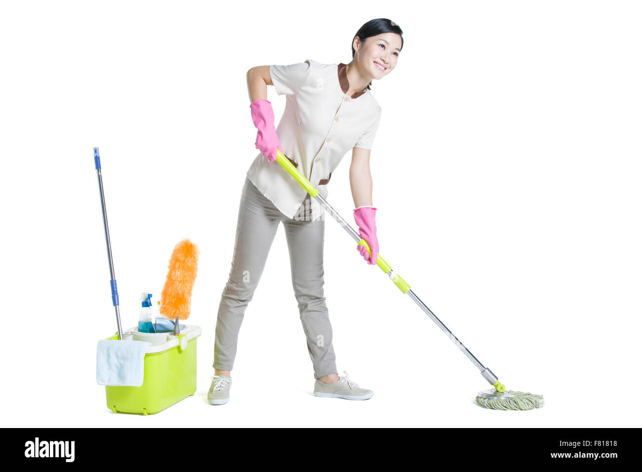 Il detergente tenendo un mop Foto Stock
