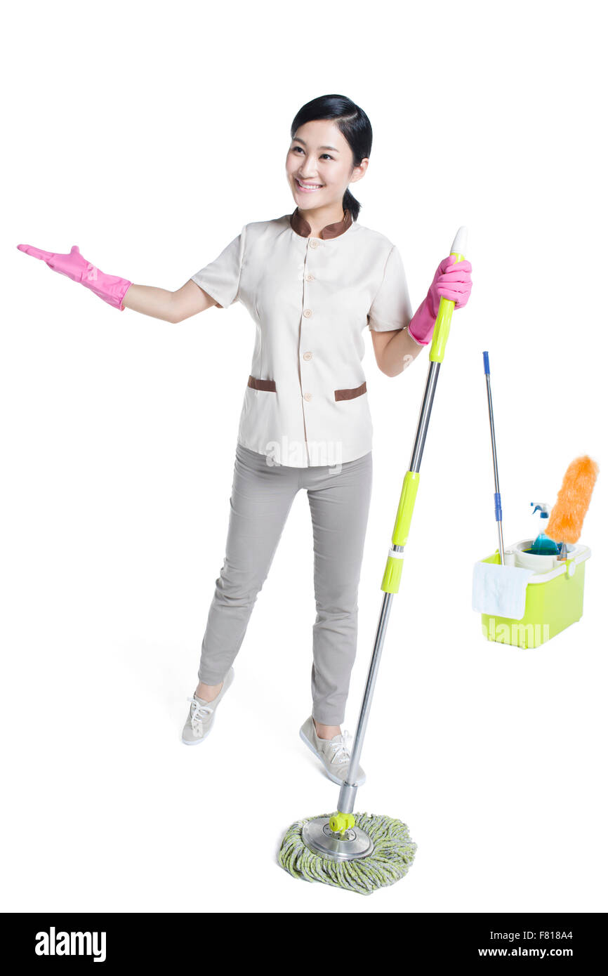 Il detergente tenendo un mop Foto Stock