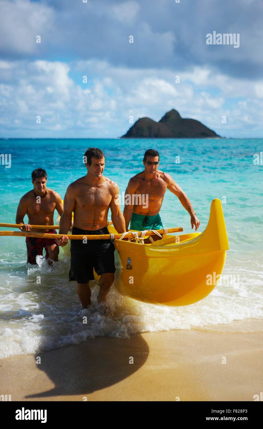 Tre outrigger canoers Foto Stock