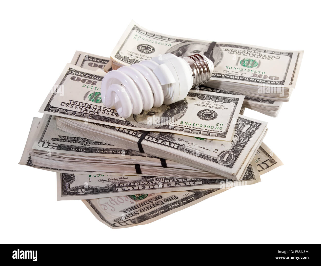 Risparmio energetico lampada fluorescente lampadina sul dollari. Isolato su sfondo bianco Foto Stock