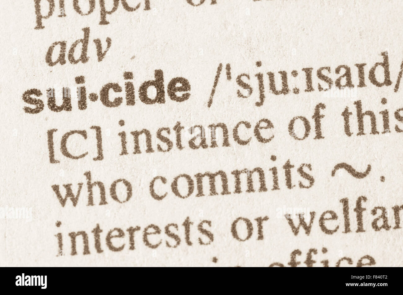 Definizione di suicidio di parola nel dizionario Foto Stock