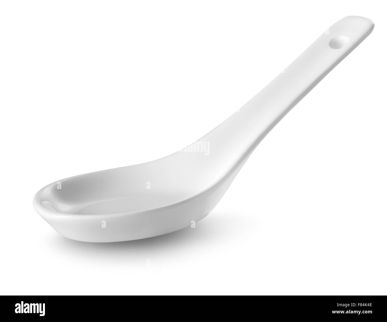 Cucchiaio in CERAMICA isolata su uno sfondo bianco Foto Stock
