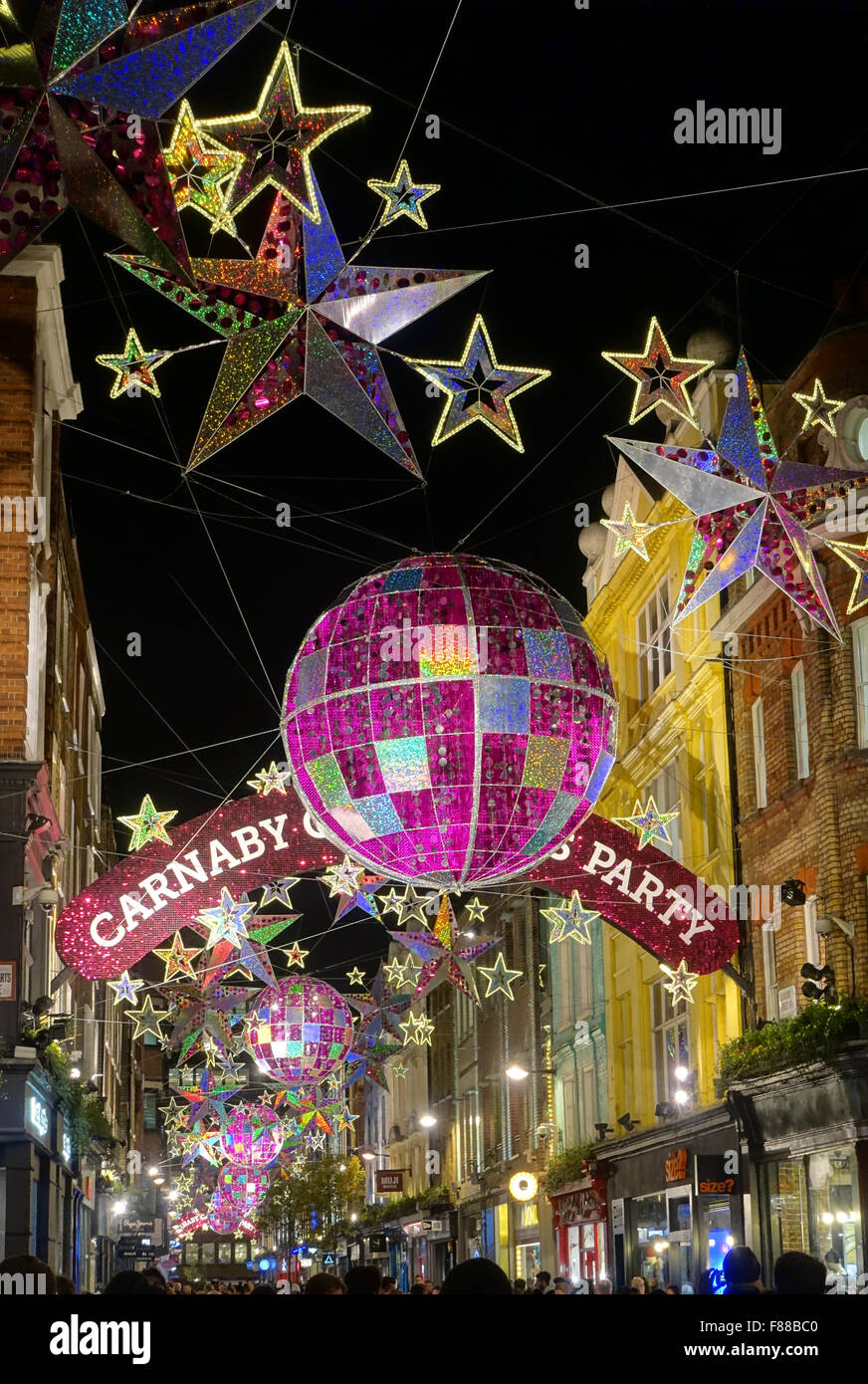 Carnaby Street decorazioni di Natale Londra Inghilterra 2015 Foto Stock
