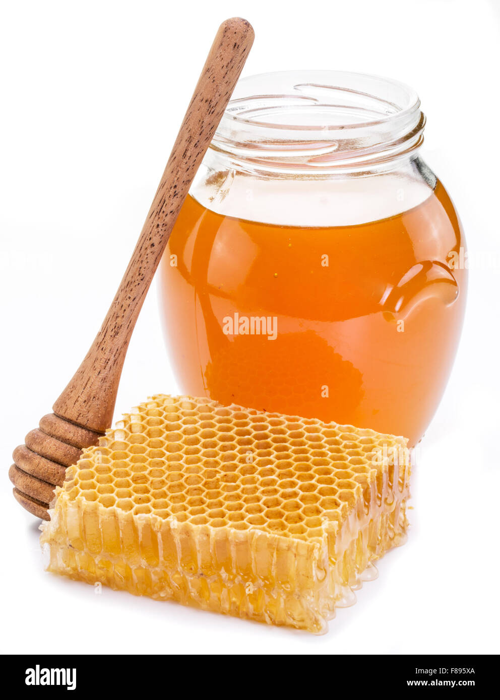 Vaso pieno di miele fresco e favi. Immagini di alta qualità. Foto Stock