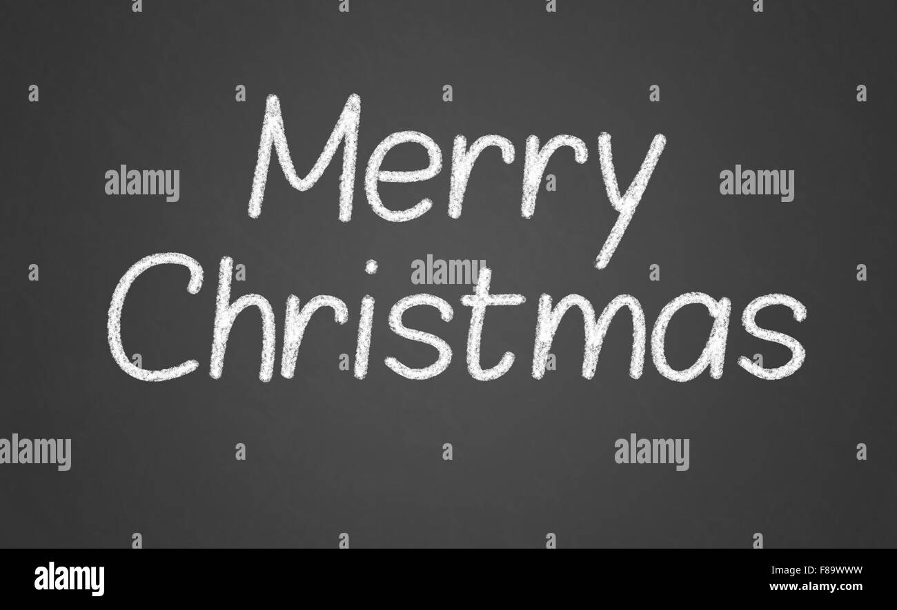 Lavagna con buon Natale messaggio Foto Stock