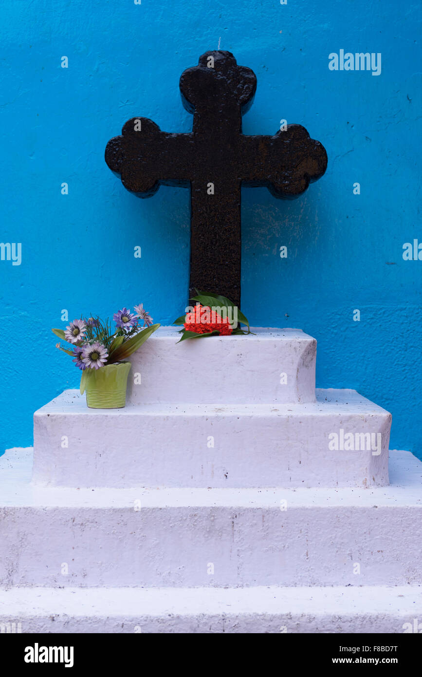 Croce di pietra santuario Fontainhas Panjim Goa in India Foto Stock