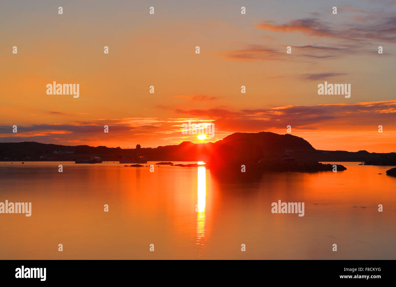 Sunset over Iona nelle Ebridi Interne di Scozia Foto Stock