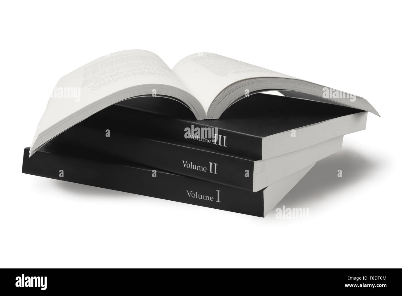 Raccolta di coperchio nero libri su sfondo bianco Foto Stock