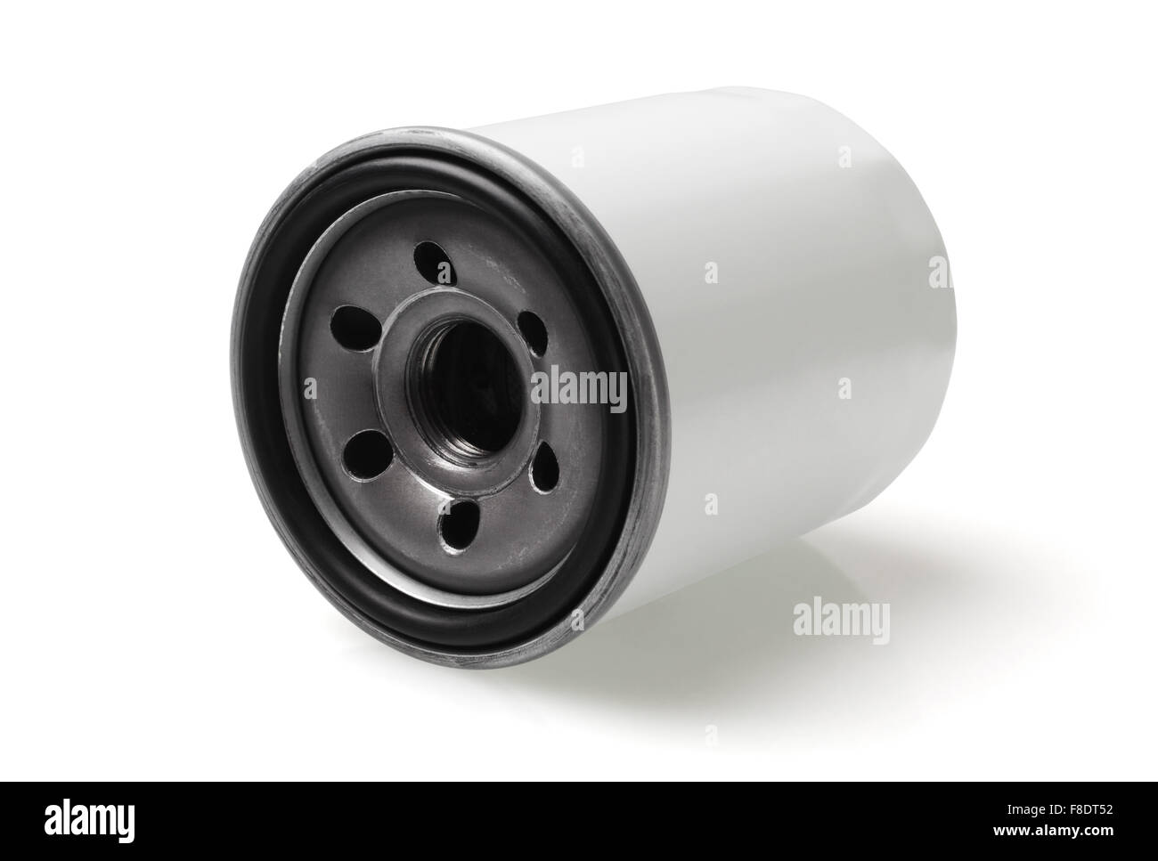 Automotive Filtro Olio giacente su sfondo bianco Foto Stock