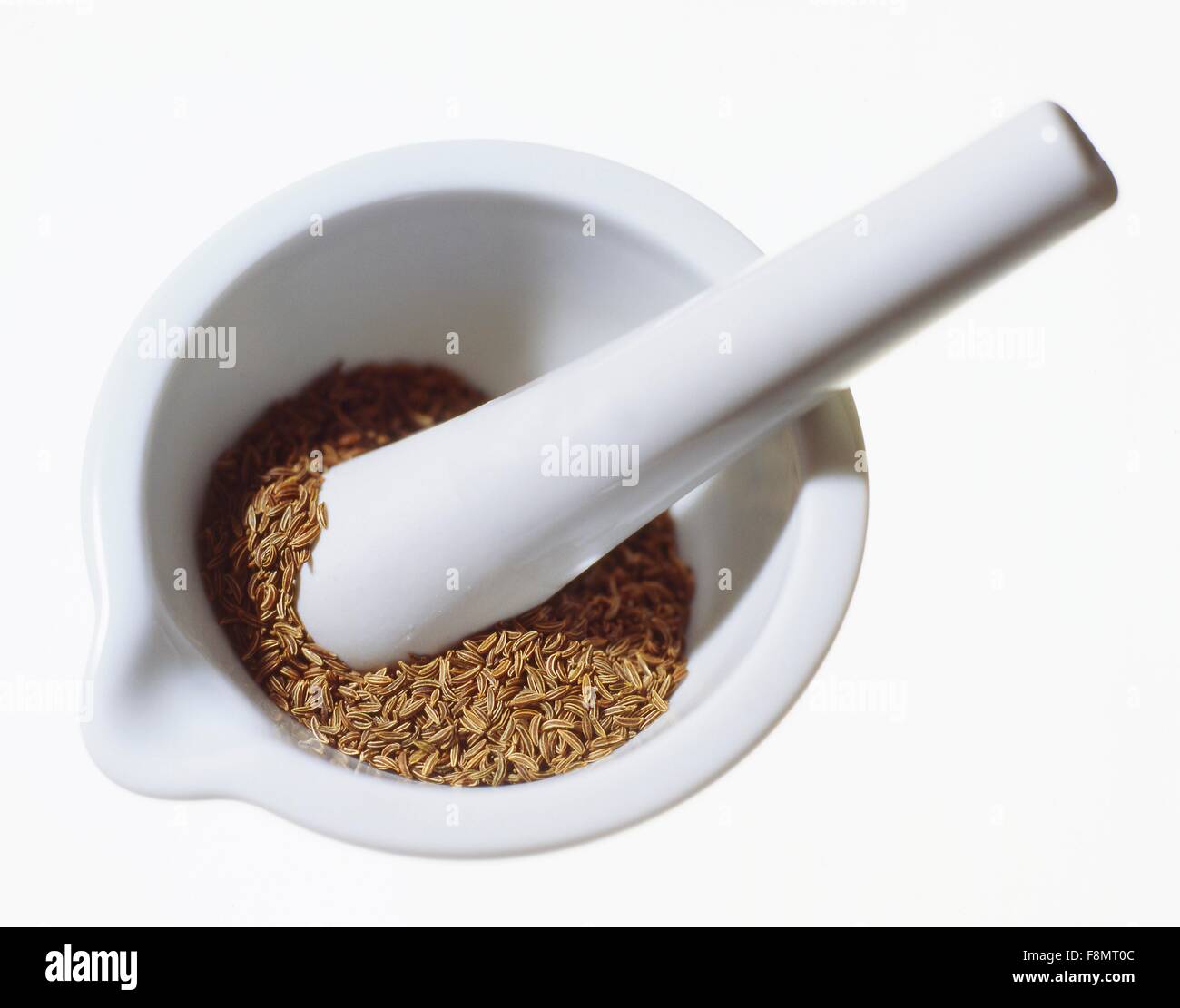 Il cumino in un mortaio Foto Stock