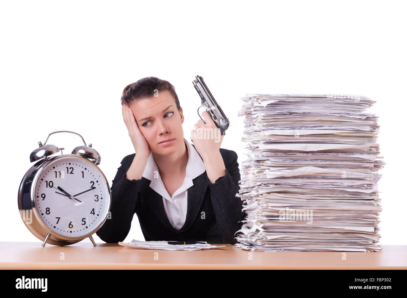 Donna con la pistola sotto stress da scadenze Foto Stock
