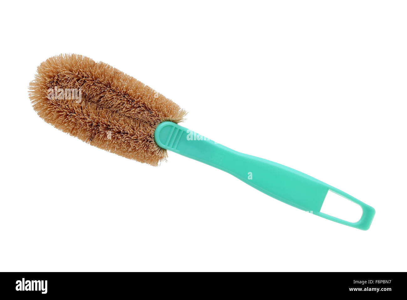Scrub spazzola con manico su sfondo bianco Foto Stock